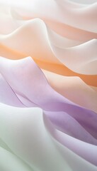 Poster - Delicate colorful fabric flows and ripples smoothly in soft light