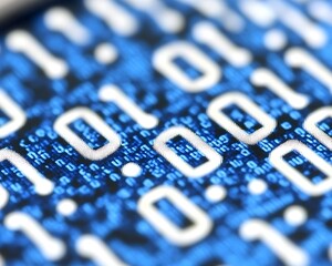 Close-up binary code digital screen