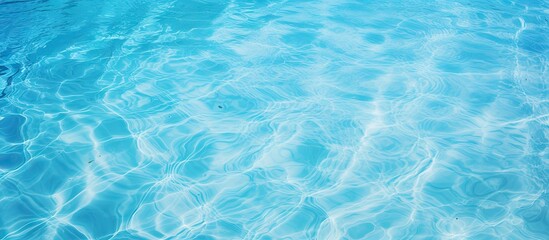 Aufkleber - Crystal clear turquoise water surface with gentle ripples, capturing sun reflections for a serene and refreshing pool background.