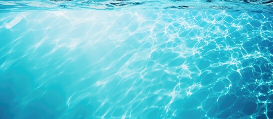 Poster - Crystal clear turquoise water surface with gentle ripples, creating a serene and refreshing ambiance. Bright reflections scattered throughout.