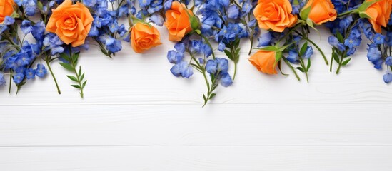 Aufkleber - Vibrant orange roses and delicate blue flowers arranged artistically over a white wooden background creating a fresh floral display.