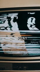 Poster - Retro tv screen glitching with play button and distorted visuals in motion