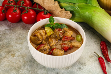 Wall Mural - Thai curry with chicken and basil