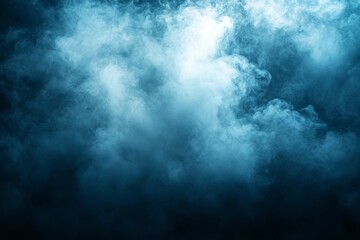 Poster - Misty blue fog enveloping the atmosphere, creating an ethereal and mysterious ambiance in a dark setting