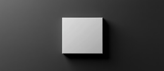 Poster - Blank Canvas Against Dark Grey Backdrop Creates Minimalistic Art Space