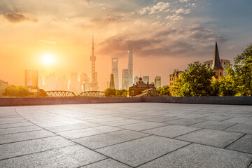 Wall Mural - Empty square floor and cityscape with skyline in Shanghai at sunrise