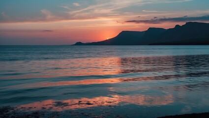 Poster - Tranquil Seascape at Sunset with Dark Mountains and Vibrant Water Reflection in Evening Light