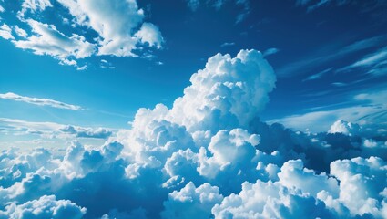 Poster - Dramatic blue sky with fluffy white clouds creating a serene and uplifting weather background for various creative projects.