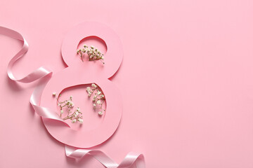 Canvas Print - Figure 8 made of paper with ribbon and beautiful gypsophila flowers on pink background. International Women's Day celebration