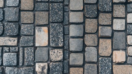 Poster - Granite textured paving stones in a detailed top view, showcasing a cobblestone sidewalk design for abstract backgrounds and artworks.