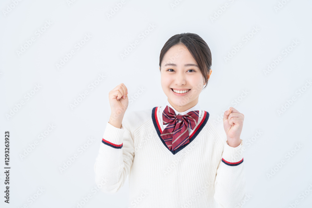 ガッツポーズの女子高生