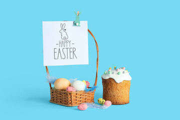 Canvas Print - Wicker basket, greeting card with text HAPPY EASTER, Easter eggs and cake on blue background