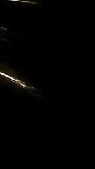 Poster - Light streaks move dynamically across a dark background, forming abstract patterns that serve as versatile filmic overlays or graphic resources