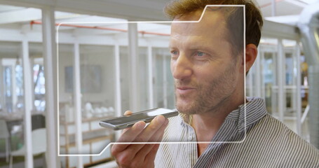 Poster - image of financial data processing over caucasian businessman using smartphone