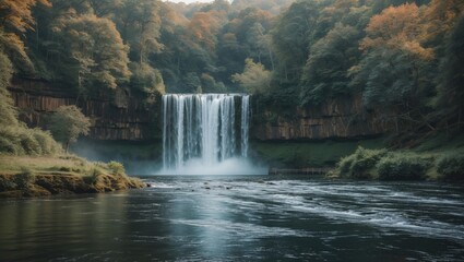 Poster - Serene Waterfall Surrounded By Lush Forest With Tranquil River Below And Ample Space For Text Or Branding