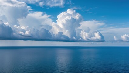 Aufkleber - Serene ocean view with vibrant blue waters and fluffy clouds under a clear sky, perfect for relaxation and nature-themed projects.