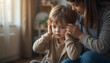 © Muhammad - Gentle caregiver comforting a distressed child, holding their head in a soothing manner in a cozy indoor setting