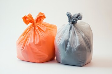 Poster - Two black trash bags sitting next to each other, likely in a urban or industrial setting