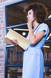 © WavebreakMediaMicro - Professional woman in blue uniform holding files, thinking in modern office