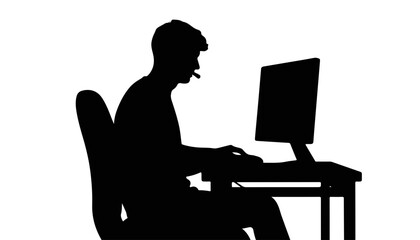 Poster - Silhouette of a man working at a computer desk at night