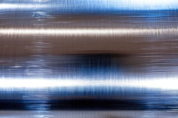 Poster - Textured metallic surface industrial setting abstract photography smooth finish close-up view modern art
