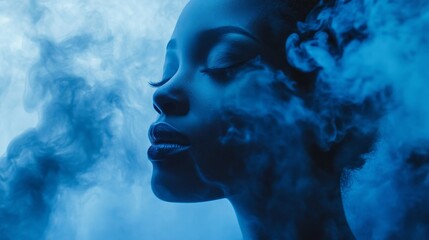 Aufkleber - A tranquil figure stands still, eyes closed, lost in thought as wisps of blue mist swirl around her. The ethereal setting creates a mystical atmosphere, evoking a sense of peace and introspection