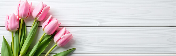 Poster - Pink Tulips Adorn A Beautifully Set Easter Table With A Simple Yet Elegant White Wooden Background In Top View.