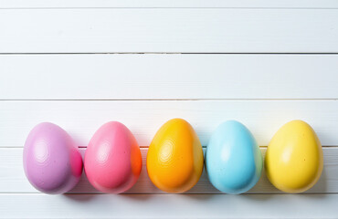 Aufkleber - Colorful Easter Eggs Arranged In A Row On A Simple White Wooden Background Create A Visually Appealing Easter Display.
