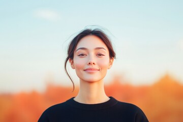 Poster - minimalistic portrait of person with serene expression against blurred background that emphasizes copy space for text
