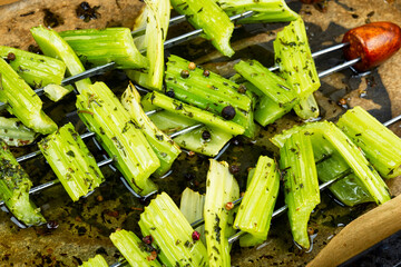 Canvas Print - Healthy food, grilled celery on skewers.