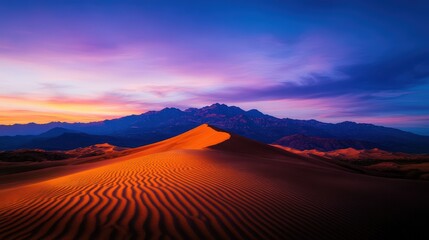Poster - Desert landscape at twilight with mountains in the background and clear sky during sunset