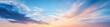 © jannik27s - Panoramic sky with beautiful clouds at sunset, featuring blue and orange colors