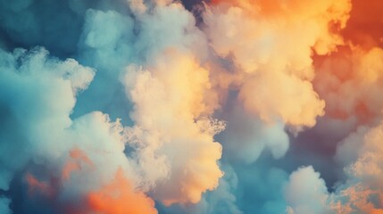 Poster - Soft textures of clouds blend beautifully as day transitions to night, creating a mesmerizing display of orange and blue colors in the twilight sky. The atmosphere feels tranquil and serene