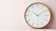 © AXYZ_STOCK - A large, round wall clock with a gold-plated frame, featuring delicate hour and minute hands with no numbers.