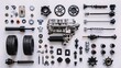 © maleyka - Spare car parts on a white background. Auto mechanics and automotive parts. Engine service with room for text.