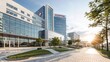 © Vlada - Modern hospital building with glass facade at sunrise