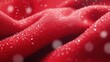 © Lion - Vibrant red fabric with dewdrops on surface