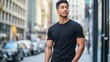 © maxximmm - Black T-shirt Urban Style. Male model in classic black cotton T-shirt standing on city street. Urban setting fashion and modern style on capital background, everyday city life lifestyle
