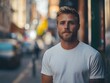 © Галя Дорожинська - Man in white t-shirt poses in urban setting with blurred background elements. Generative AI.