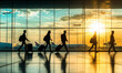 © Valery - A group of people walks through an airport with luggage