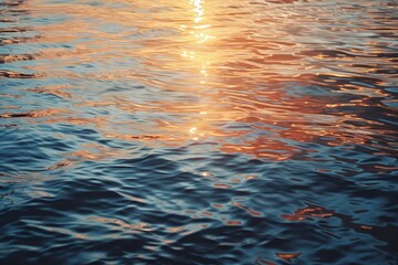 Poster - A calming image of a sunset reflected in the rippling surface of the water, A peaceful sunset reflecting on the water's surface