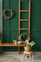 Canvas Print - Interior of living room with Easter wreaths, wooden bench and ladder