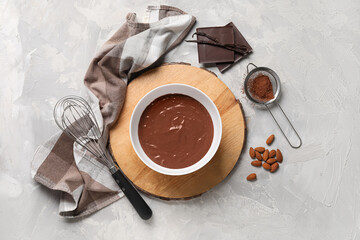 Canvas Print - Bowl with hot chocolate on grunge grey background. Top view