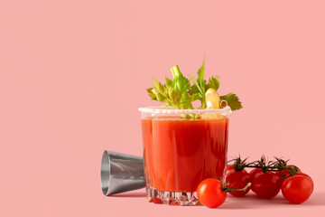 Poster - Glass of bloody mary with celery, lemon slice, tomatoes and measuring cup on pink background