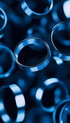 Poster - Blue metal rings suspended in a dark three dimensional space