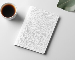 Aufkleber - Minimalist Workspace Elegance Textured White Notebook with Organic Leaf and Rich Coffee - Modern Productivity and Creative Design Inspiration