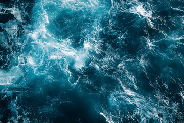 Poster - Aerial View of Deep Blue Ocean Waves and White Foam, Showcasing the Natural Beauty of Marine Textures and Dynamics on a Sunny Day at Sea with Natural Light