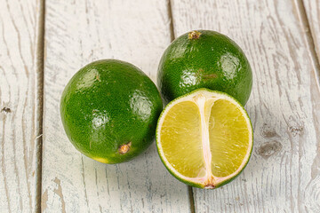 Wall Mural - Ripe ggeen juicy lime heap