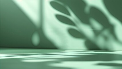 Poster - Soft green light casts delicate shadows from plant leaves onto a textured surface during the afternoon