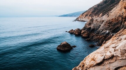 Poster - Majestic ocean view from rocky cliffs with gentle waves lapping at the shore : Generative AI
